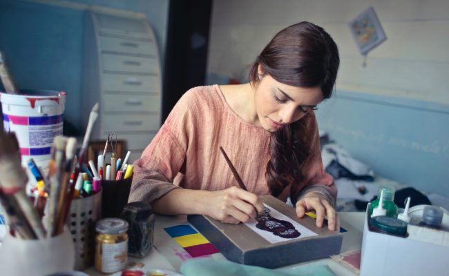 Woman painting.